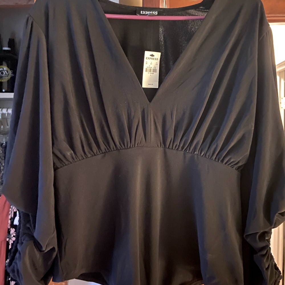 Never worn, Express bodysuit in black